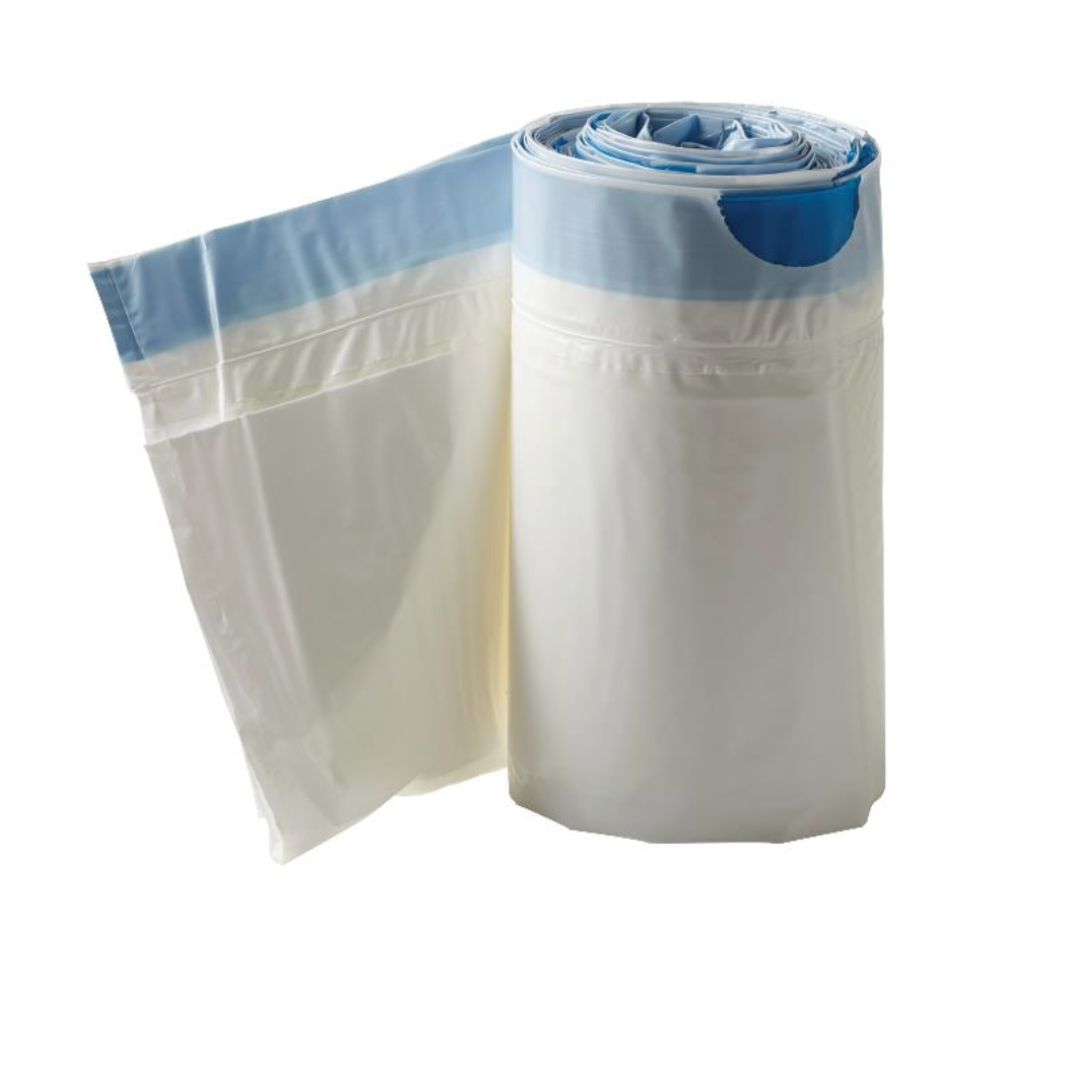 A roll of Medline Commode Liners with Absorbent Pad stands upright, with partially unrolled bags draping to the side. A blue strip along the top edge suggests a closure feature, making it perfect for hygienic waste management. The plain white background emphasizes its practicality.